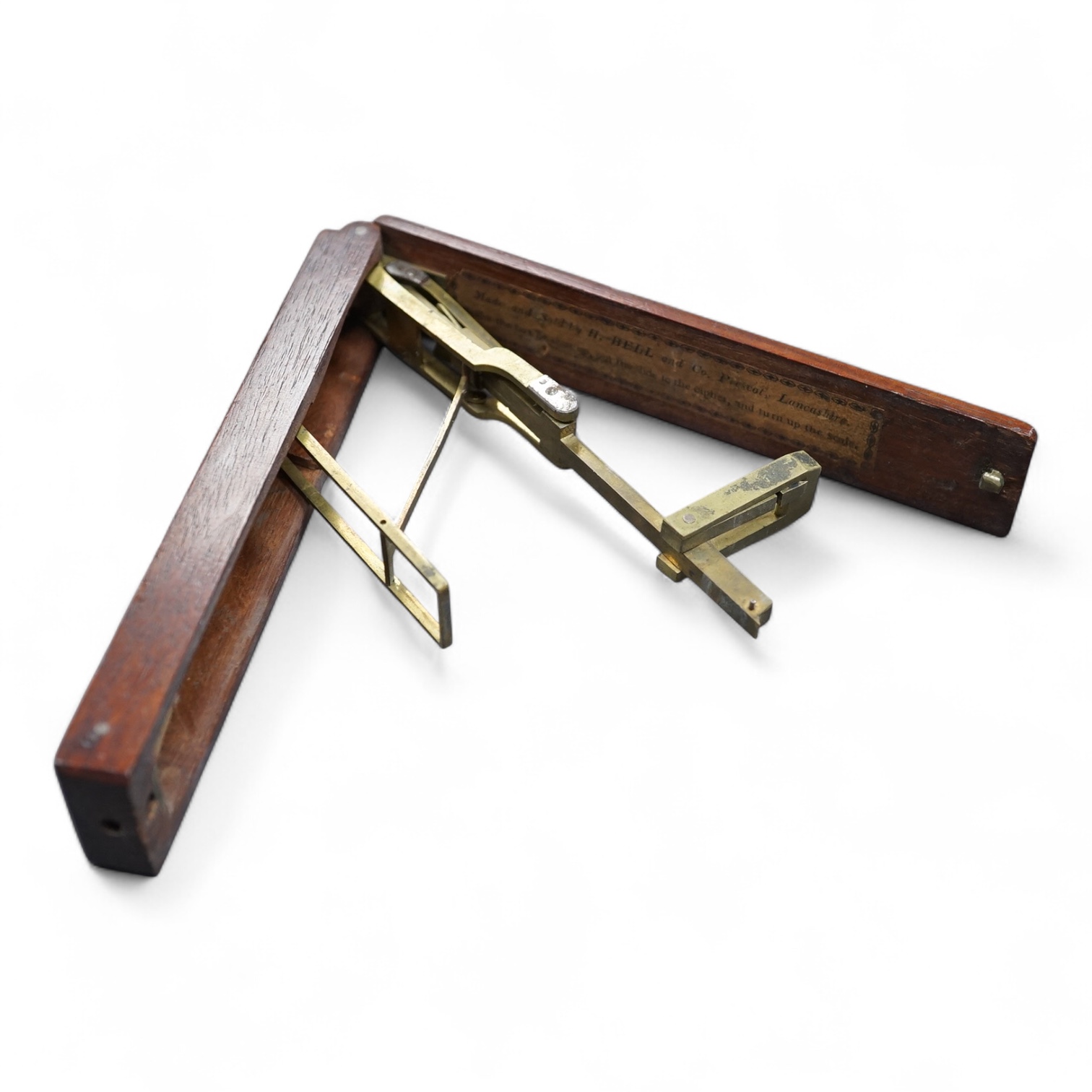 A set of 19th century brass and mahogany folding sovereign scales, 14cm long.